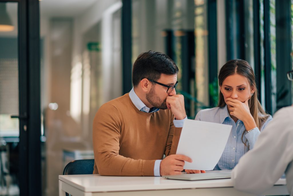 two people planning the data fabric technology solution for the company