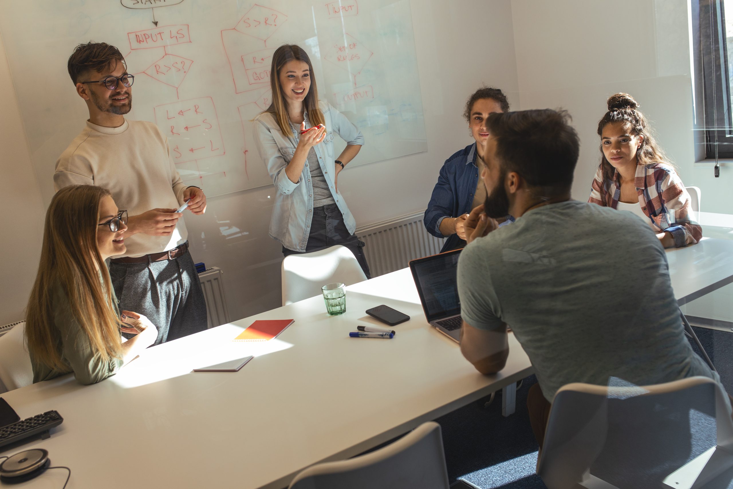 Multishoring BizTalk consultants collaborating on integration solutions in a dynamic team environment